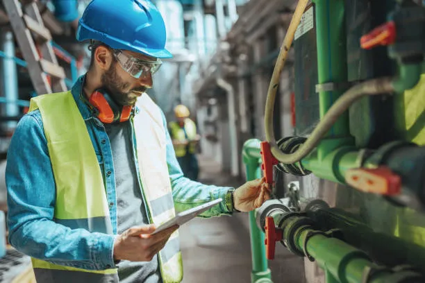 Plumber using advanced tools for inspection